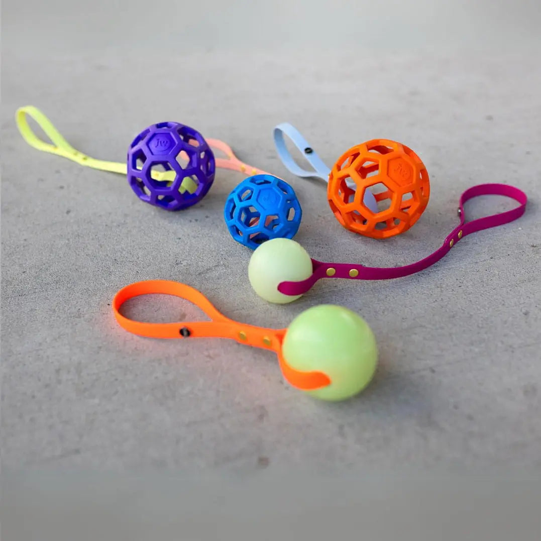 Piłka świecąca w ciemności do szarpania L - 7,5 cm, MAX GLOW Chuckit! BURA